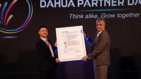 Image of Kevin Chen, president, Dahua WEU, receiving the CC EAL 3+ Certificate from Xavier Vilarrubla, CEO, Brightsight.